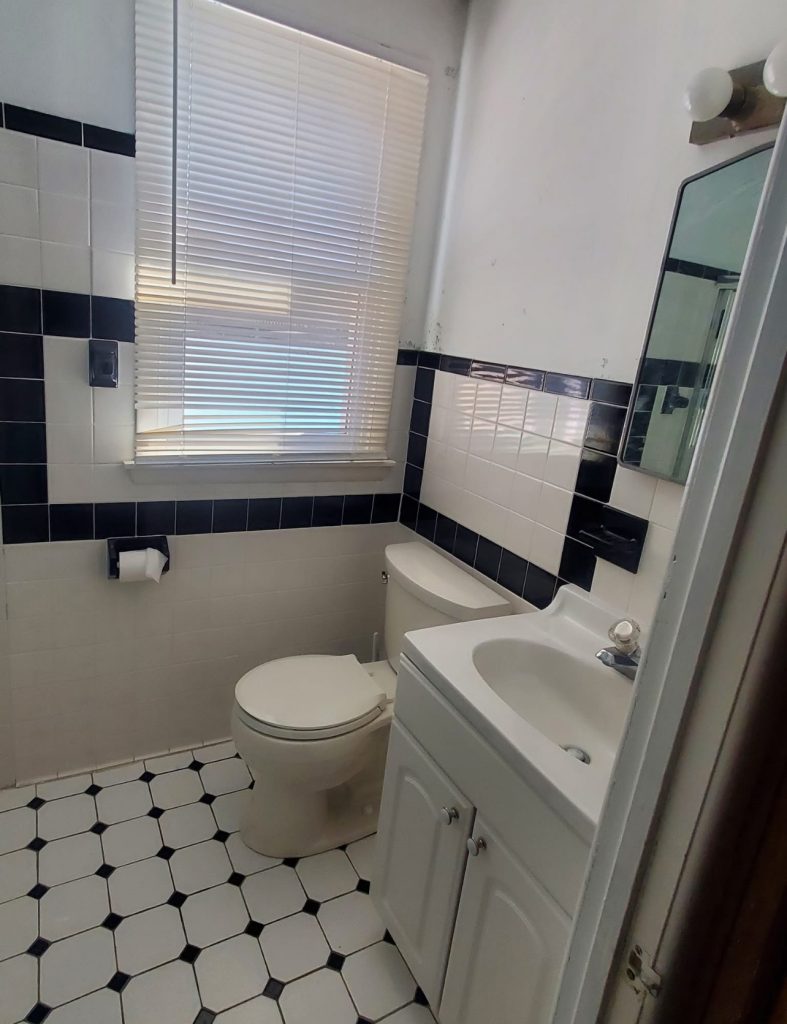 North Wilmington Small Bathroom Remodel – Before Small bathroom before remodeling in North Wilmington, DE with existing vanity, tile, and fixtures